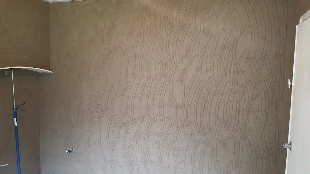 Interior wall prepared for damp proofing and finishing