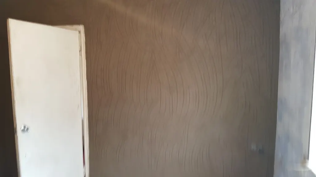Interior wall after damp proofing preparation and replastering